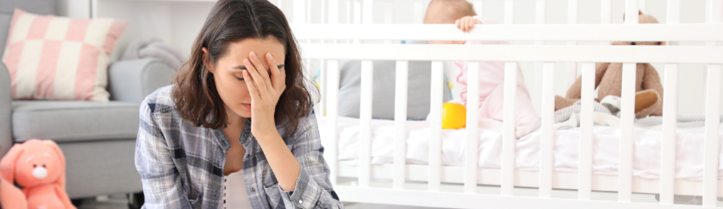 What is postpartum depression? What are their symptoms and causes?