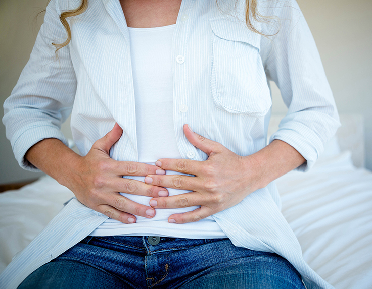 Pregnant women experiencing a bloating and gas problems


